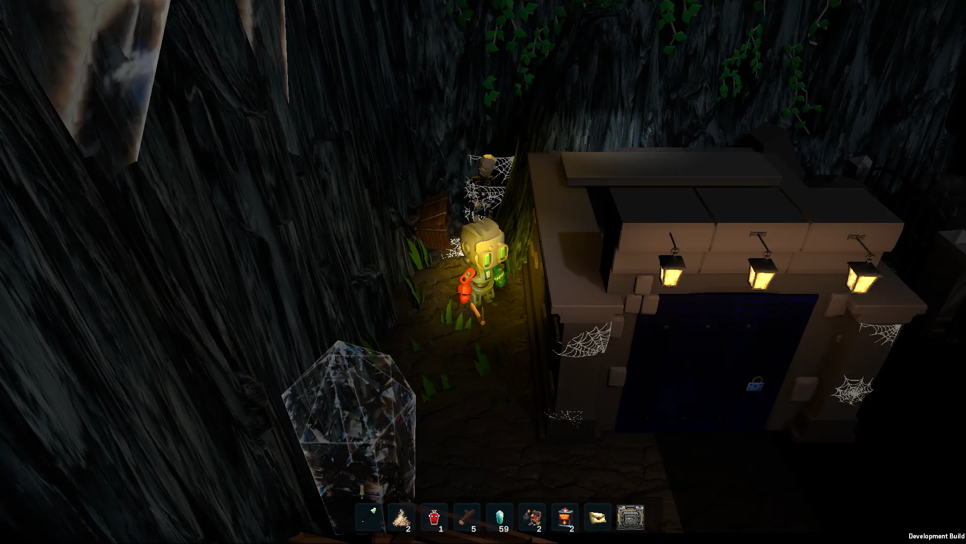 A locked stone crypt at the mouth of a deep cave